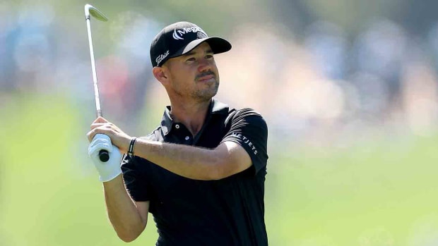 Brian Harman is pictured watching a shot during the final round of the 2024 Players Championship at TPC Sawgrass in Ponte Vedra Beach, Fla.
